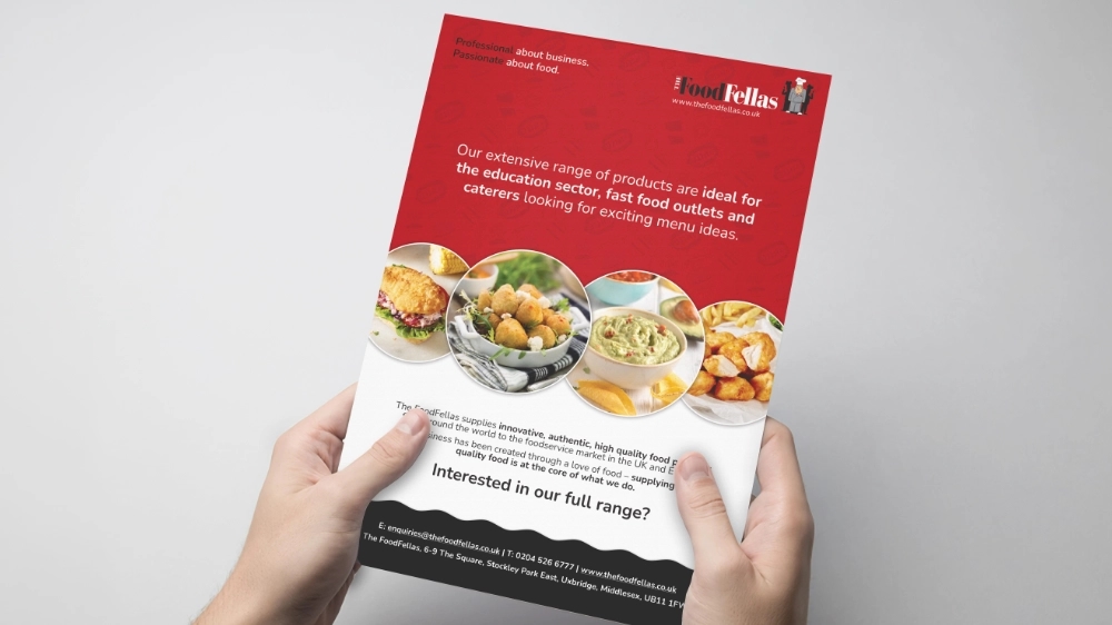 The FoodFellas sales flyer held in hand