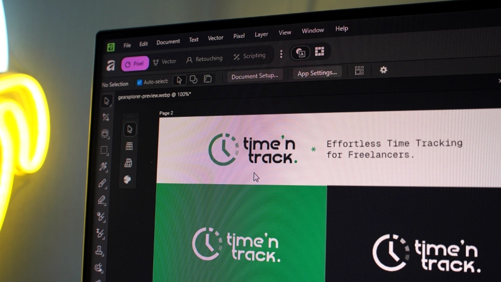 Time 'N Track logo and tagline being designed on screen
